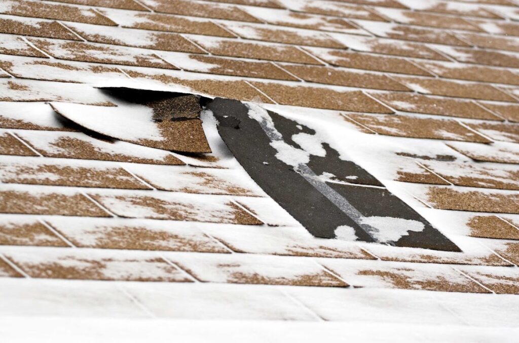 most common winter roofing challenges in New England