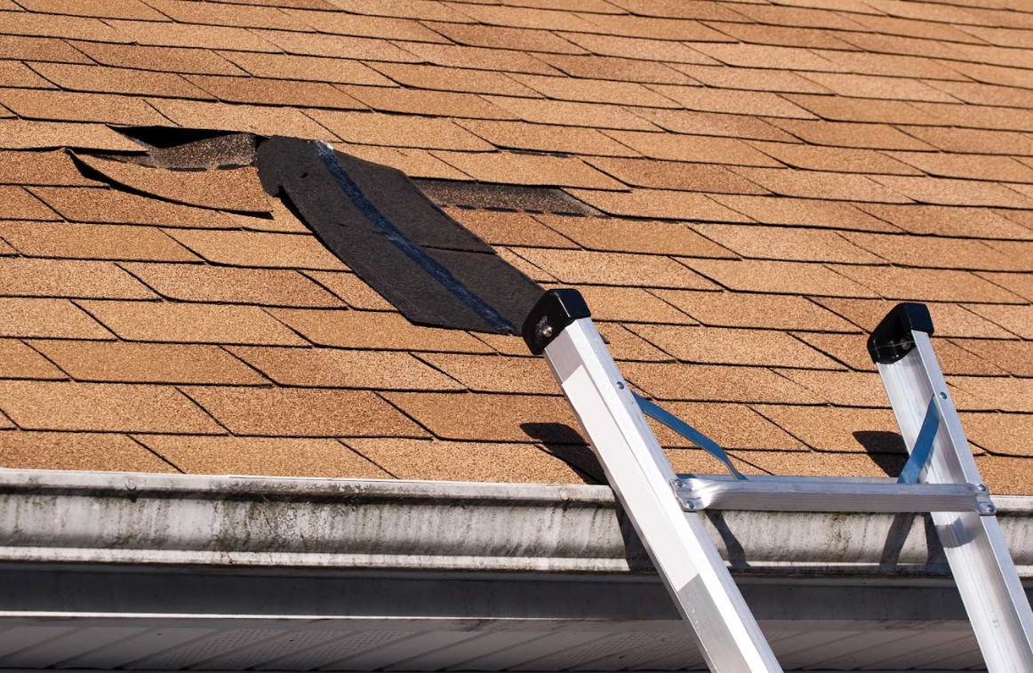 storm damage roof repair in Hanover, MA