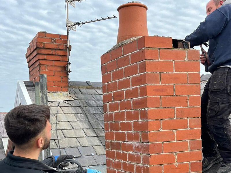 Chimney pointing and repointing to restore deteriorating mortar joints