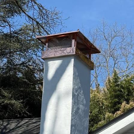 Durable copper flue cap providing chimney protection